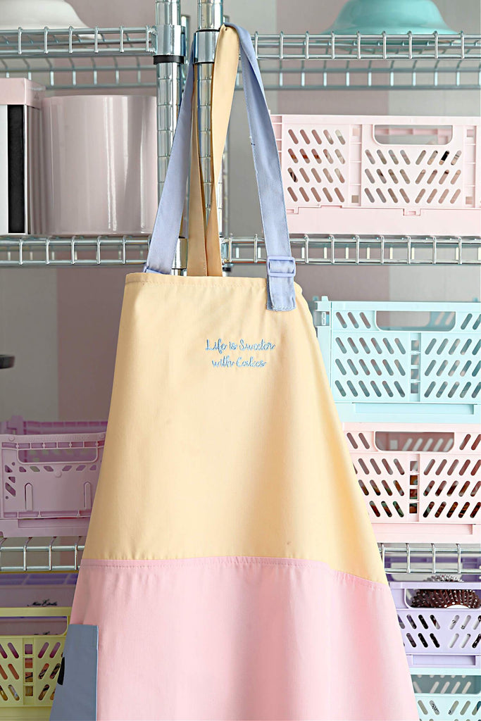 Love, Manuela Aprons apron-yellow-pink